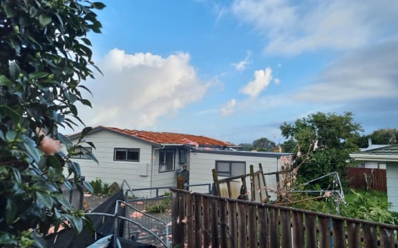 A house on Aorangi Road, Paraparaumu, had its roof lifted off by the ornado that swept through early Tuesday morning.