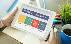 CORPORATE SOCIAL RESPONSIBILITY CONCEPT ON TABLET SCREEN