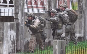 US soldiers participate in a South Korea-US combined arms collective training exercise at the US army's Rodriguez shooting range in Pocheon, about 70 km northeast of Seoul near the heavily-fortified border with North Korea on September 19, 2017.