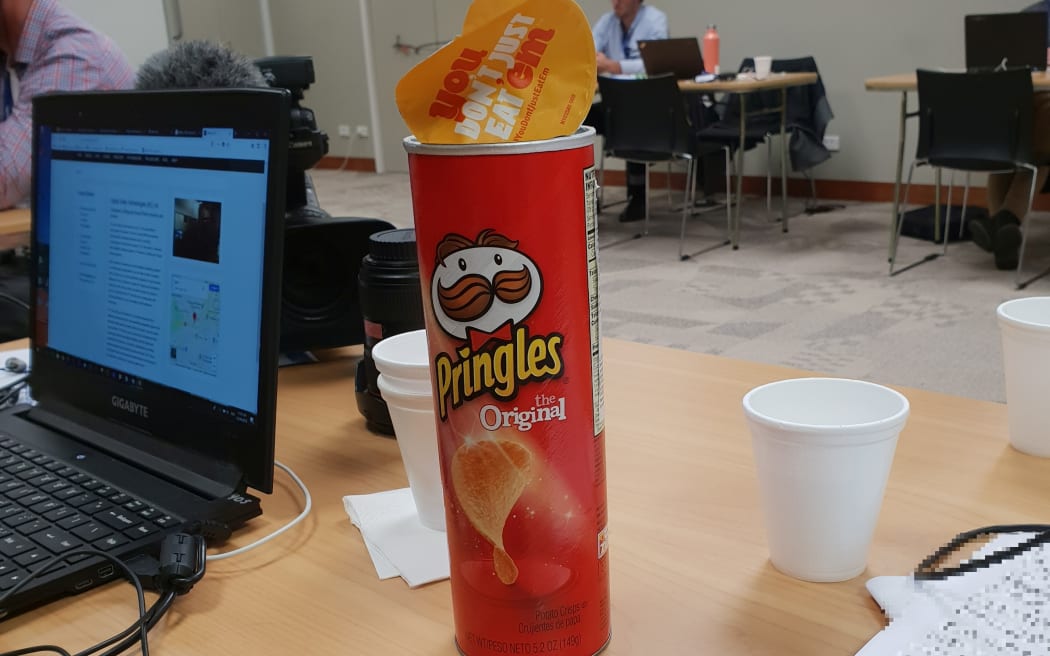 Journalists at Auckland City Hospital in making do with chips and coffee as the waiting continues.