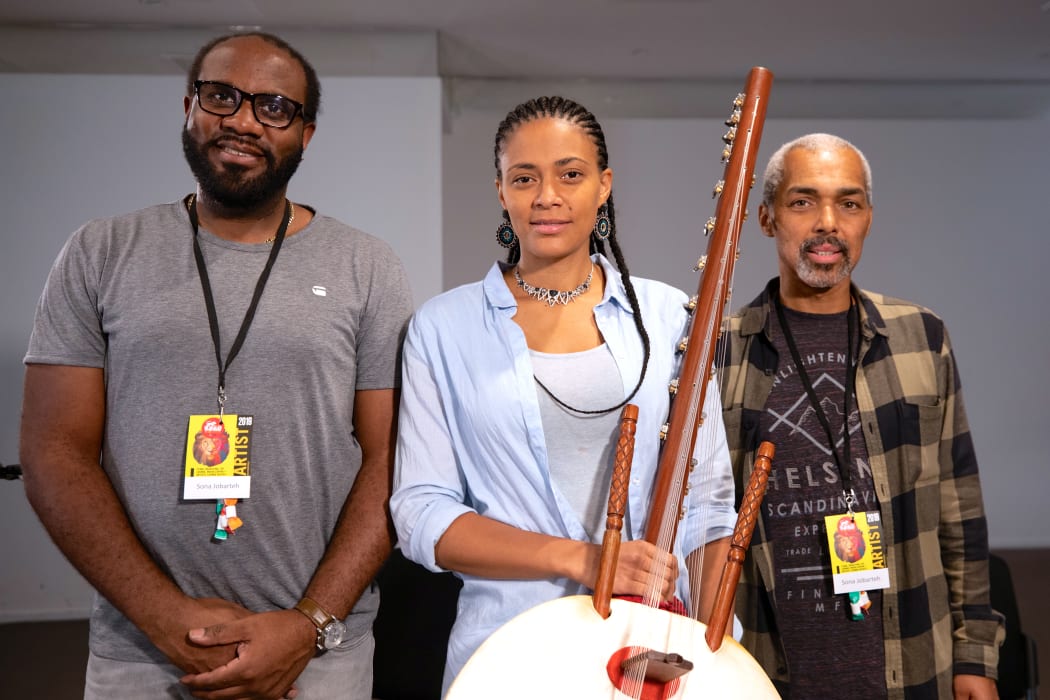 Sona Jobarteh,  guitarist Derek Johnson ® and percussionist Westley Joseph (L)