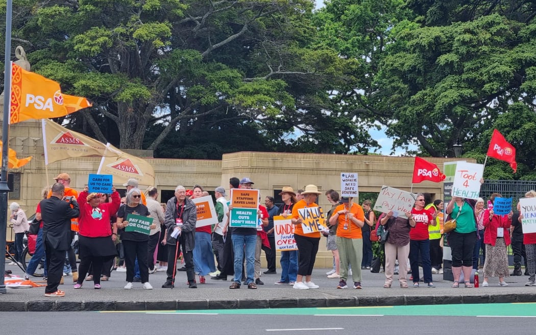 In Auckland, hundreds of striking workers picketed outside the central hospital.