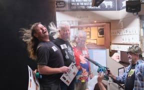 Contestants have their mullets blown in the breeze at the 2022 Crowded House contest.