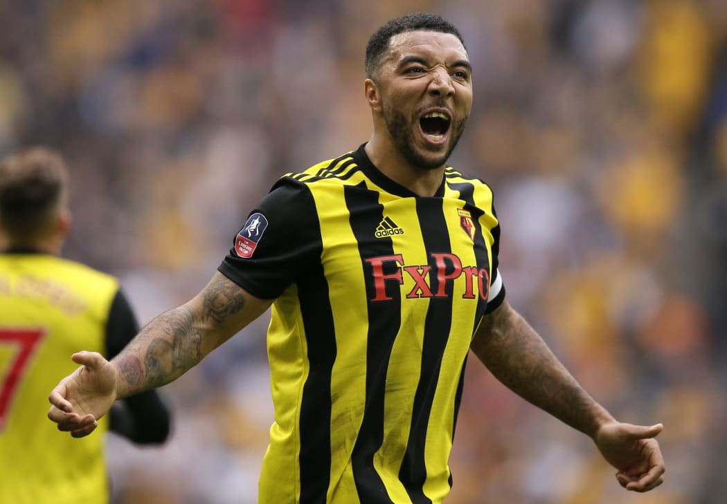 Watford's Troy Deeney celebrates after scoring his side's second goal during the English FA Cup semifinal soccer match between Watford and Wolverhampton Wanderers at Wembley Stadium in London,  April 7, 2019.