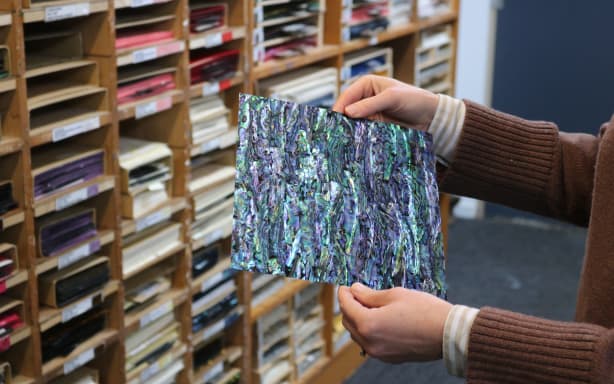 Pāua shells transformed into a veneer sheet for crafts, furniture, jewellery and other purposes.
