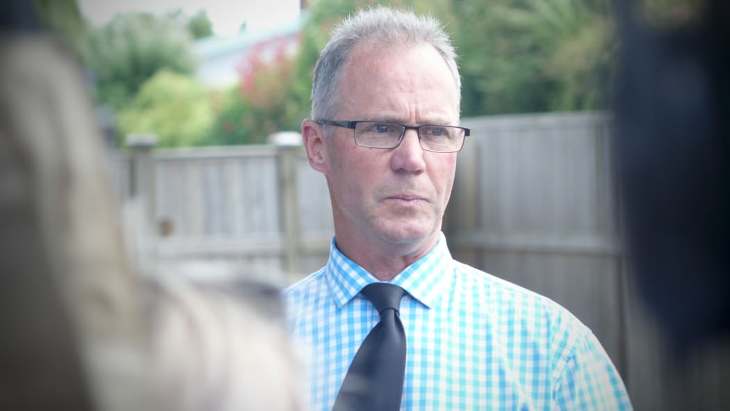 Detective senior sergeant Roger Small outside Cunxiu Tian's home.