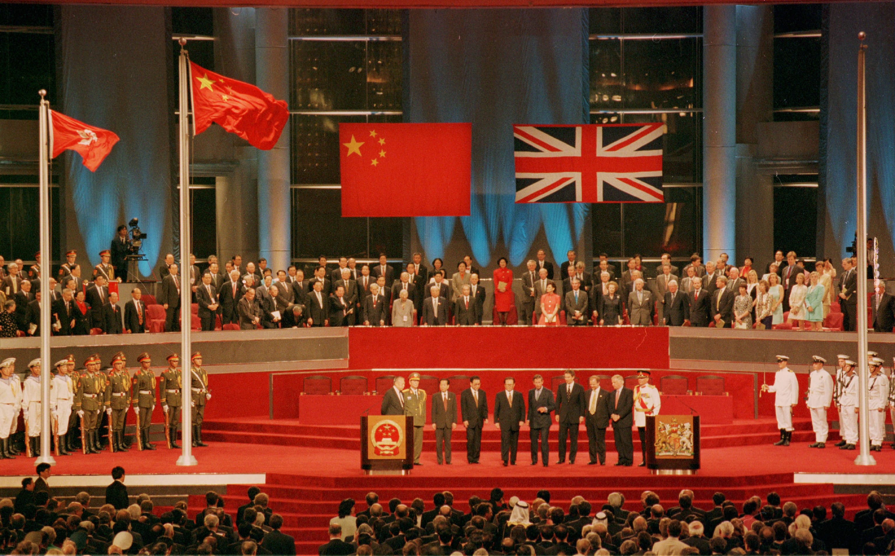 Chinese and British leaders attend the Hong Kong handover ceremony held on 1 July, 1997.