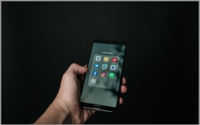 Hand holding phone