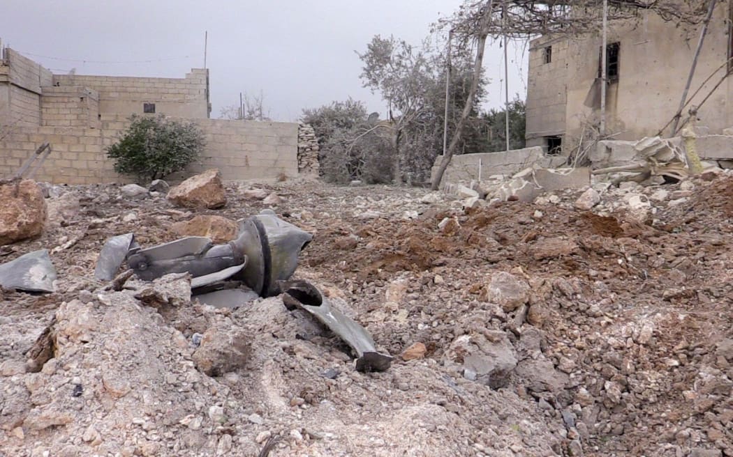 Damaged buildings are seen after Syrian regime and pro-regime terrorist groups carried out airstrike in the Russian resort city of Sochi, in Jarjanaz village of Syria