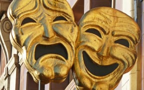Tragedy and comedy masks are traditional representations of acting and theatre.