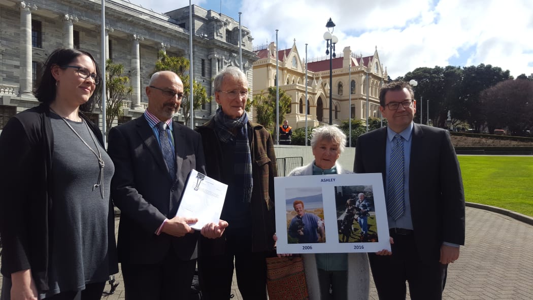 A petition over Ashley Peacock's care is presented to Parliament on 15 September 2016. Left to right: Kimberley Hall from Autism NZ, Kevin Hague, Ashley's parents Dave and Marlene, Grant Robertson