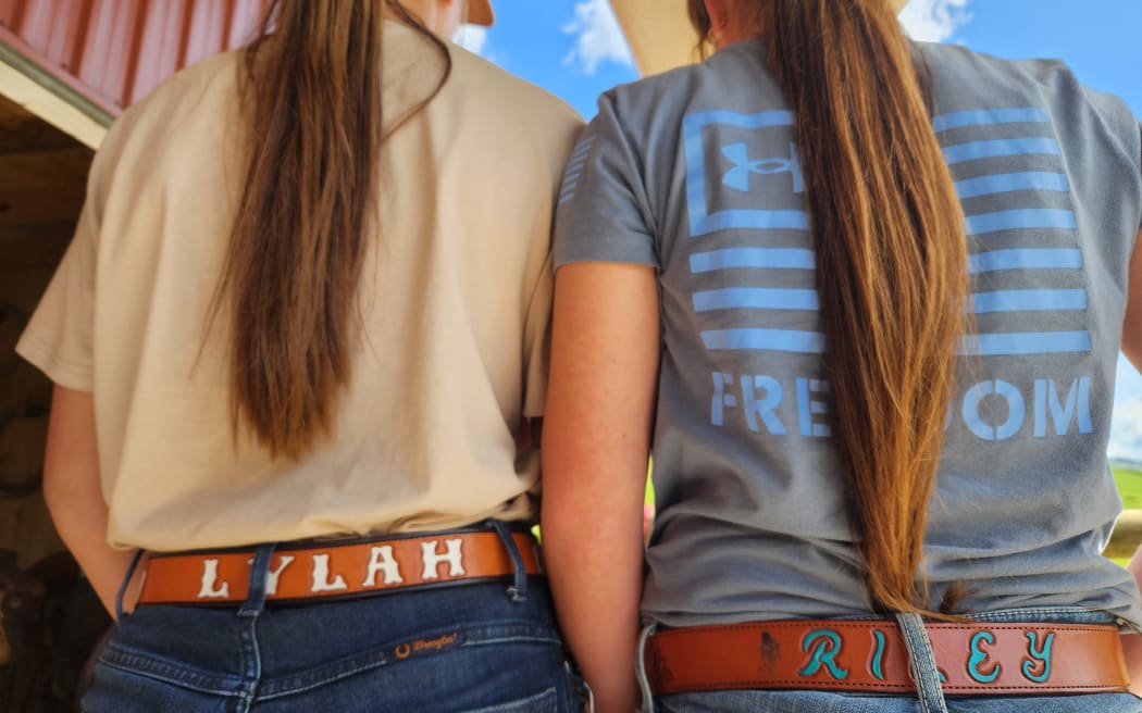 Lylah and Riley Wood in their signature belts