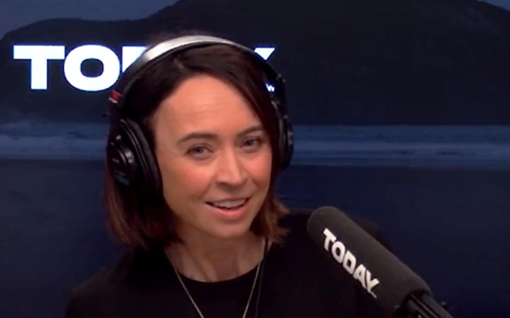 Tova O'Brien listens to revenue minister David Parker in an interview on Today FM.