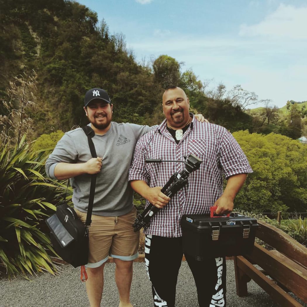 Filmmaker Jamie Dunn (left) spent ten weeks filming strongman Levi Vaoga (right).