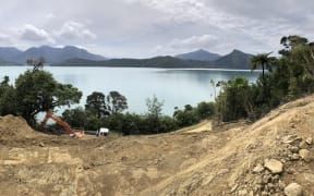 Progress being made at "The Rock" on Kenepuru Road as road repairs continue following the July storm.