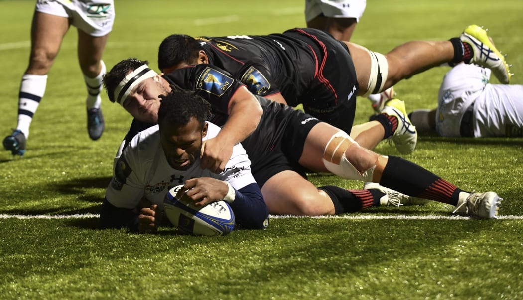 Clermont's Fijian wing Alivereti Raka scores a try during the European Rugby Champions Cup match against Saracens in December.