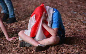 England's fans are disappointed after the football match between Iceland and England at the Champ-de-Mars fan zone in Paris on 27 June 2016.