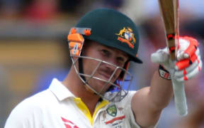 The Australia batsman David Warner celebrates his half century.