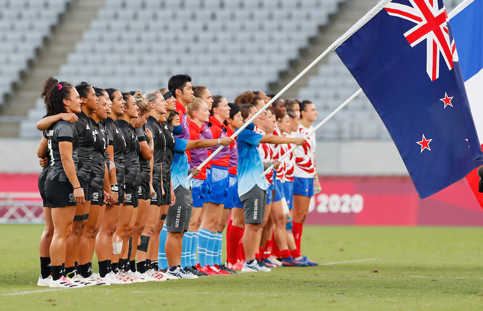 The Black Ferns women's sevens team and the French team stand for the anthems at the Tokyo Olympics, 31 July 2021
