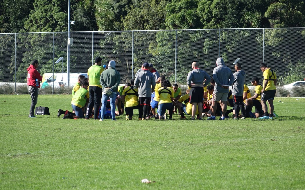 Tonga take a break during their training camp in Auckland.