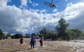 New South Wales State Emergency Service (SES) officials involved in rescue work in the flooded towns around the overflowing Wyangala Dam near Cowra. Australia's east coast has been repeatedly swept by heavy rainfall in the past two years, driven by back-to-back La Nina cycles.