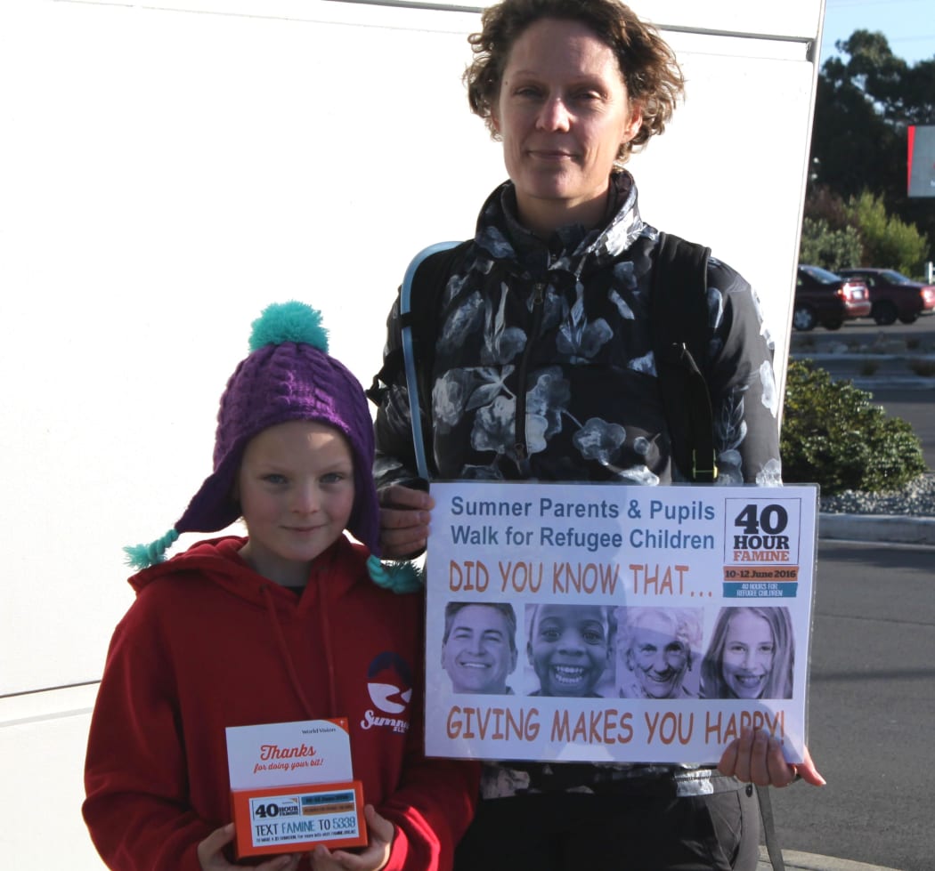 A photo of Tessa and her mother, Lucy, fundraising for Syrian refugees in Ferrymead