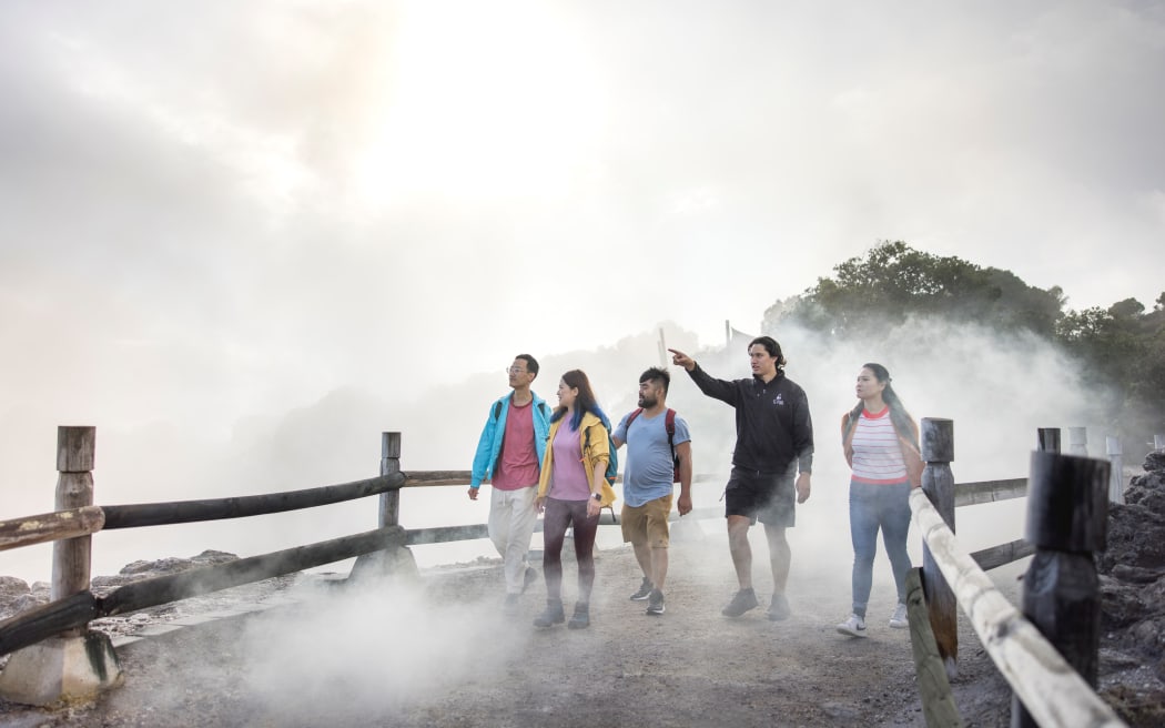 Visitors at Te Puia explore Whakarewarewa Geothermal Valley