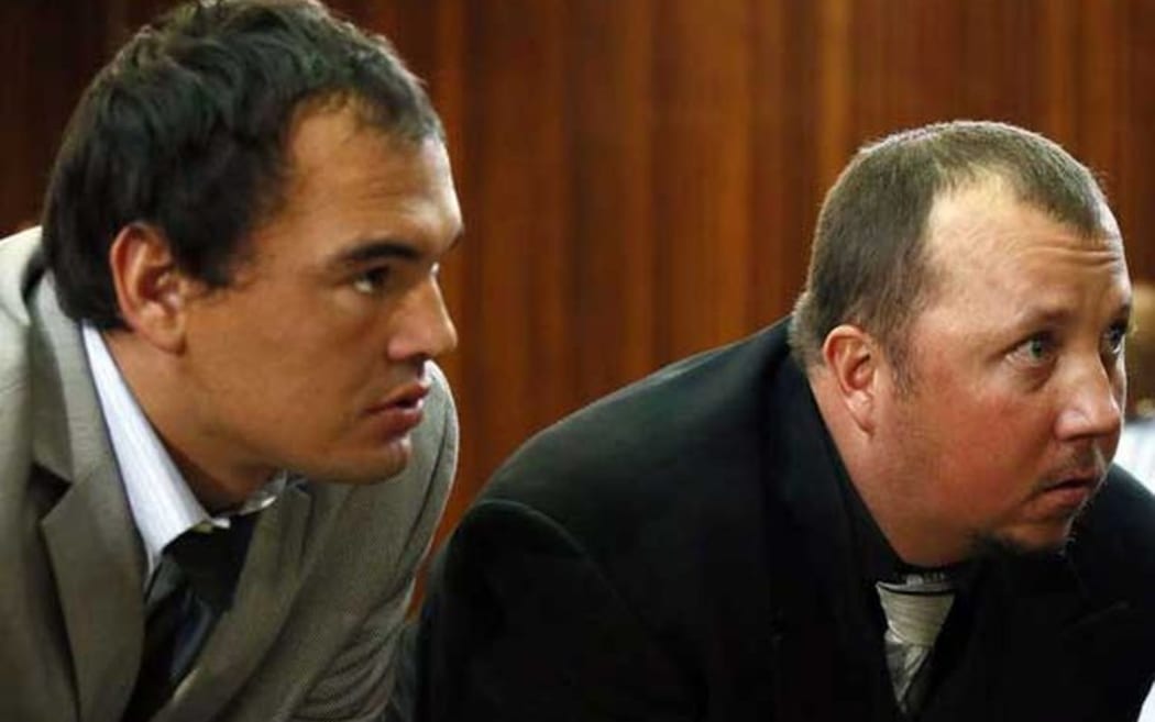 Theo Martins Jackson and Willem Oosthuizen during their trial.