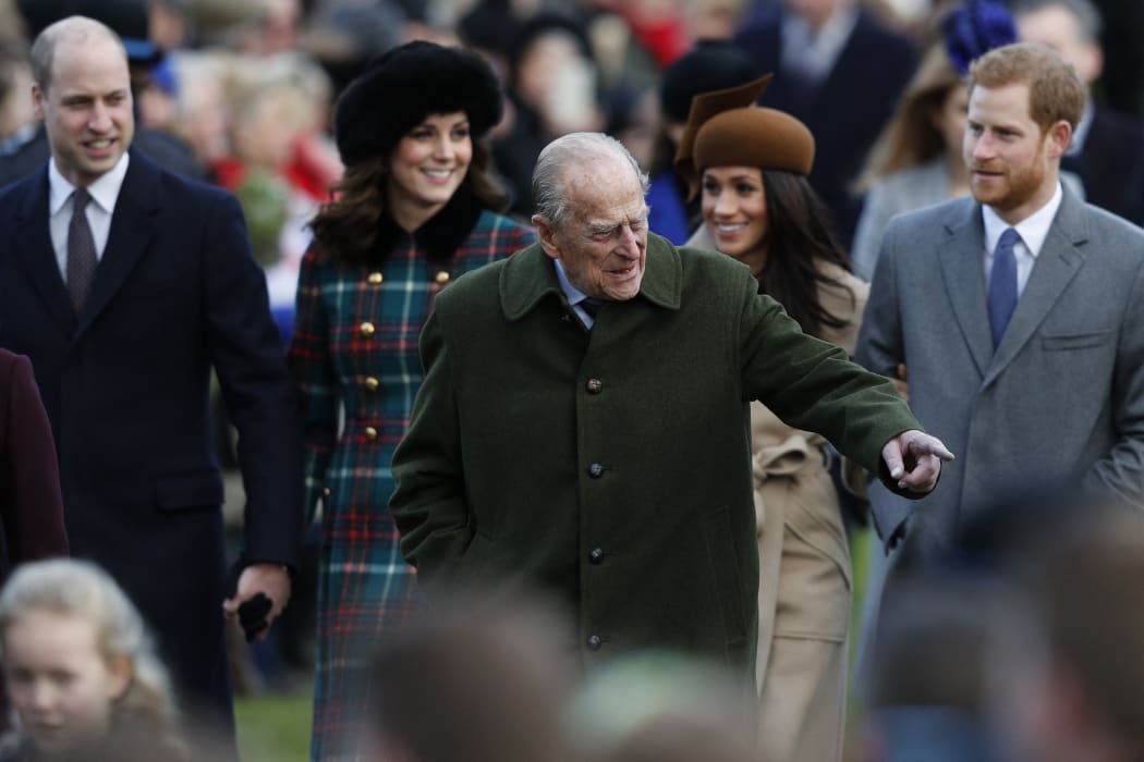 Prince Philip pictured with Prince William, Kate Middleton, Prince Harry and Meghan Markle at the Royal Family's traditional Christmas Day church service at St Mary Magdalene Church in Sandringham, Norfolk, eastern England, on December 25, 2017.