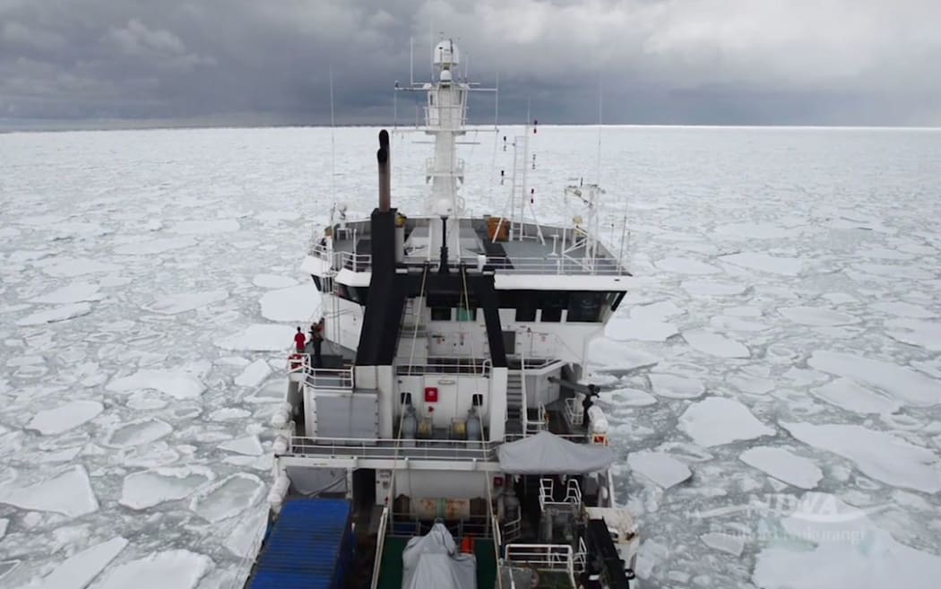 The Tangaroa picks its way through the ice.