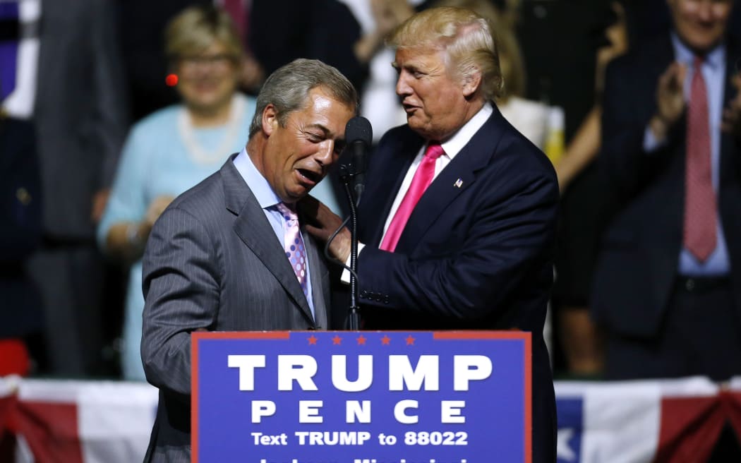 UKIP leader Nigel Farage (l) out on the campaign trail with Donald Trump.