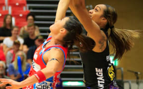 Magic's Malia Paseka competes for the ball with Swifts' Sharni Layton