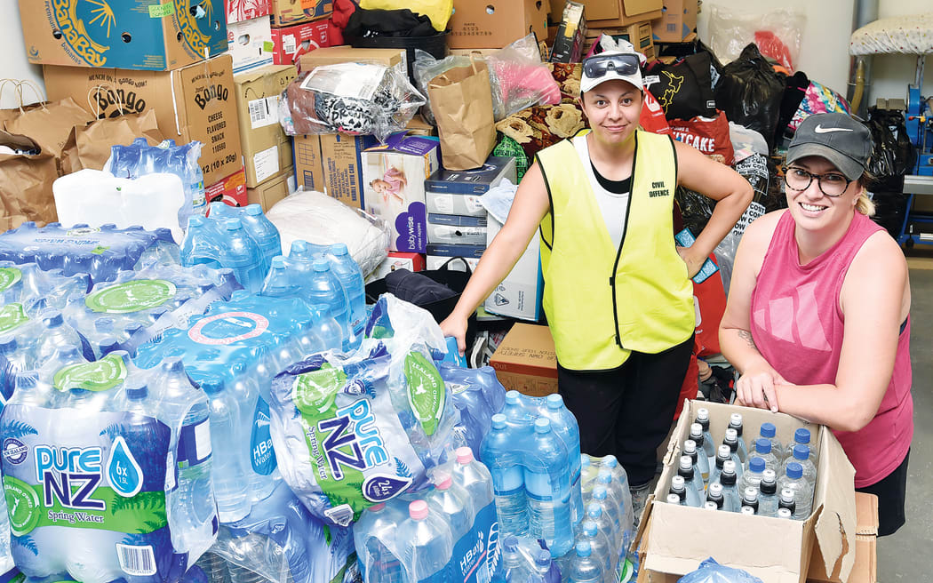 Waikohu Civil Defence public information manager Nicky-Marie Kohere-Smiler with Charity Rutene at Te Karaka Area School. Goods have been donated from as far afield as Northland and Taranaki.
