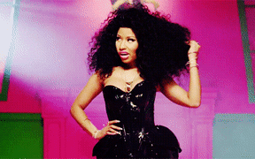 an animated gif of Nicki Minaj flicking her hair