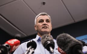 Acting Wellington district commander inspector Dion Bennett speaks to media after police take over scene of fatal fire at Loafers Lodge on 17 May, 2023.