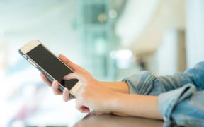 Woman use of mobile phone