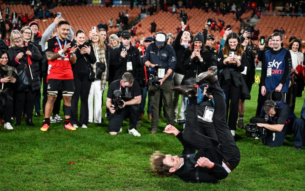 Crusaders head coach Scott Robertson celebrates with his traditional break dance after winning 2023 Super Rugby title.