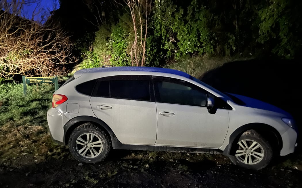 Ben Fox's car, a white 2013 Subaru Impreza.