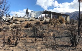 The framework is all that remains of this Lake Ōhau Village home.