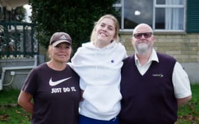 Bridie Young with her parents