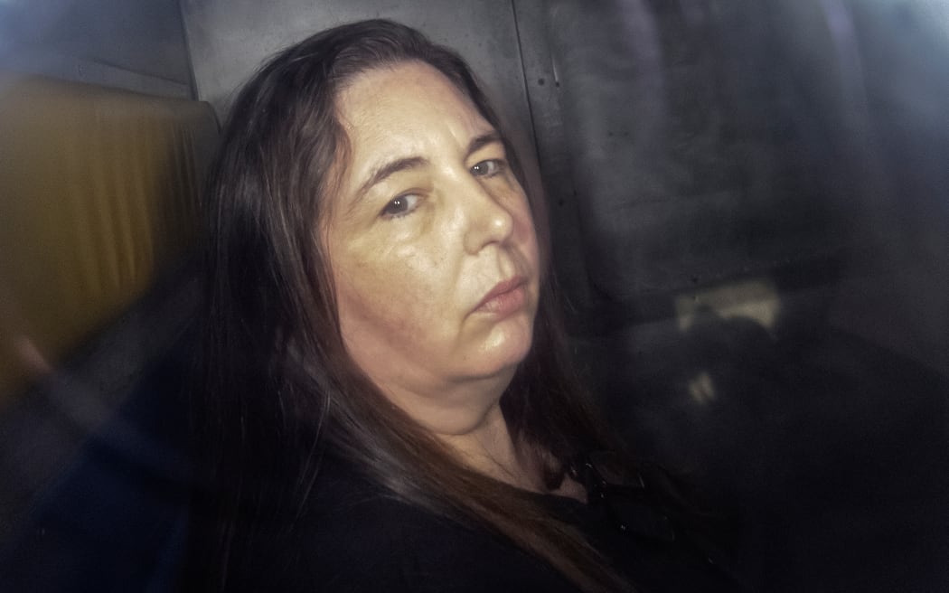 Erin Patterson arriving in the back of a prison transport vehicle at Latrobe Valley Magistrate's Court in Morwell, Australia.