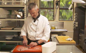 Head chef Hamish Blair hard at work in Larnach Castle's kitchen.