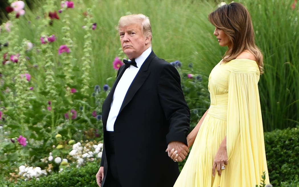 US President Donald Trump and First Lady Melania Trump leave the US ambassador's residence in London, heading to Blenheim Palace for a dinner on the first day of a UK visit.