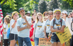Activists, including Parkland shooting survivor David Hogg, on the 50 Miles More walk against gun violence in Springfield on 26 August 2018.