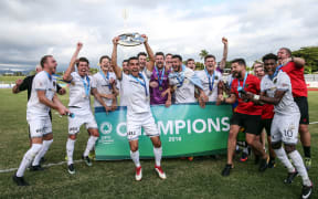 Team Wellington celebrate winning the Champions League
