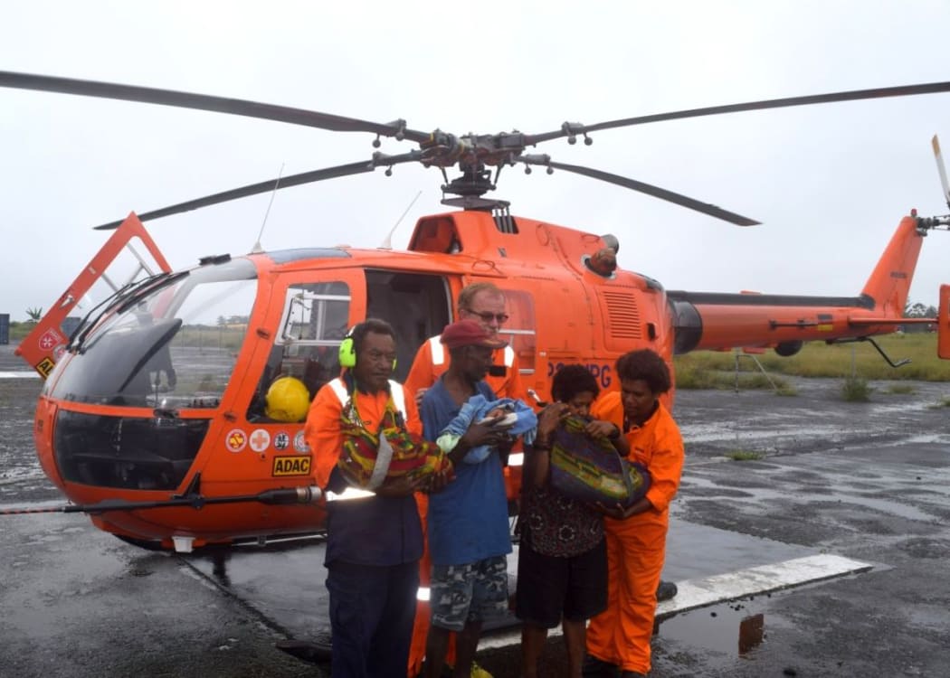 Gile Sayiyong arrives at Lae Heliport
