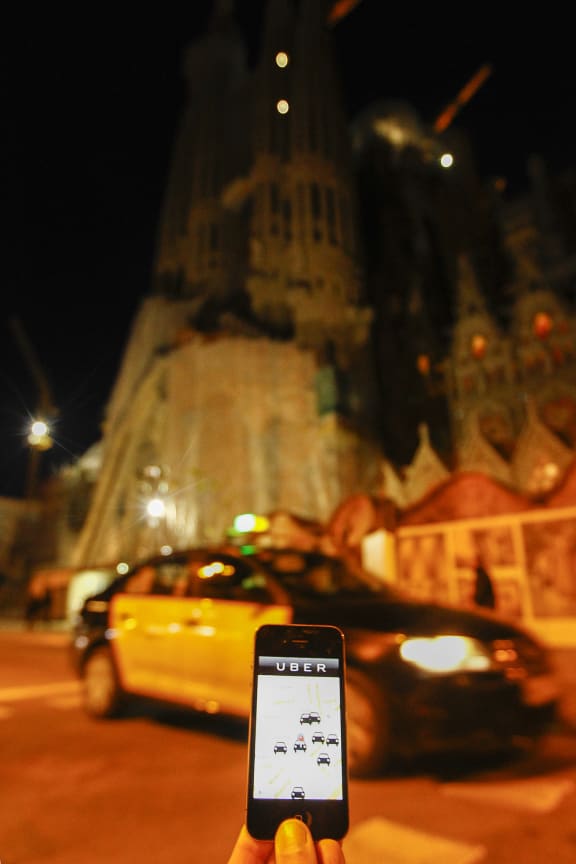 A Madrid judge has banned the popular Uber smartphone taxi service from operating in Spain.