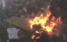 A fire in a rubbish truck.