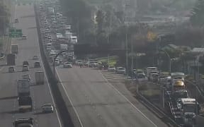 Police have closed south-bound lanes of Auckland's Southern Motorway following a crash involving a fleeing driver.