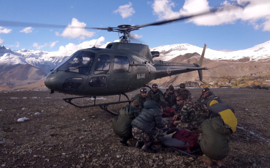 A climber is rescued in the Himalayas.